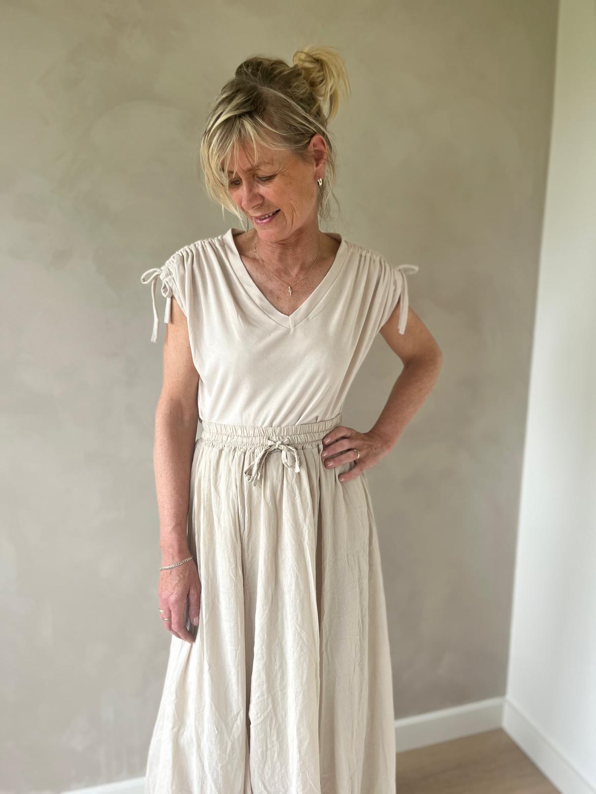 Mouwloze top beige